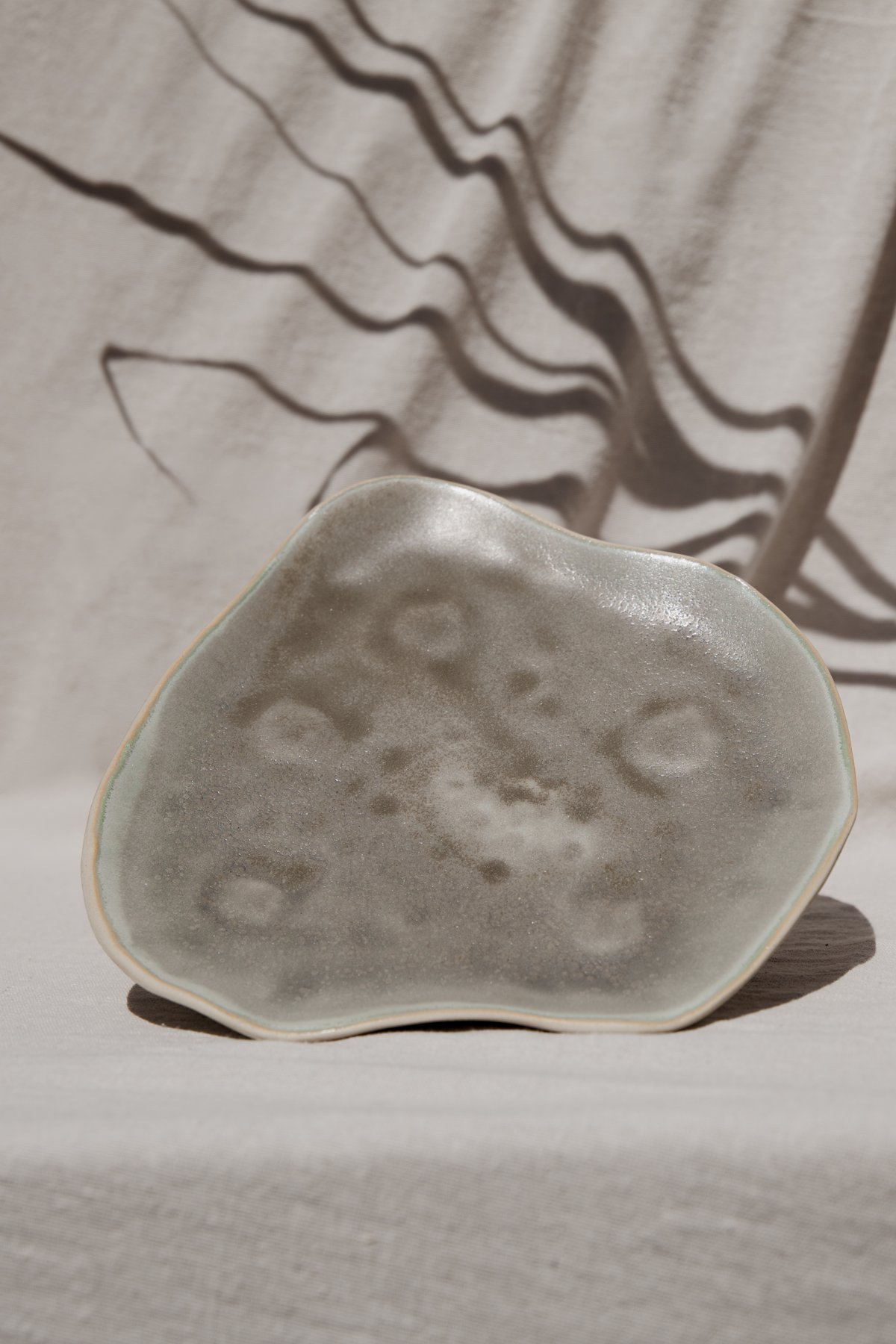 The Pedestal Tray &mdash; overhead view of the matte glazed surface
