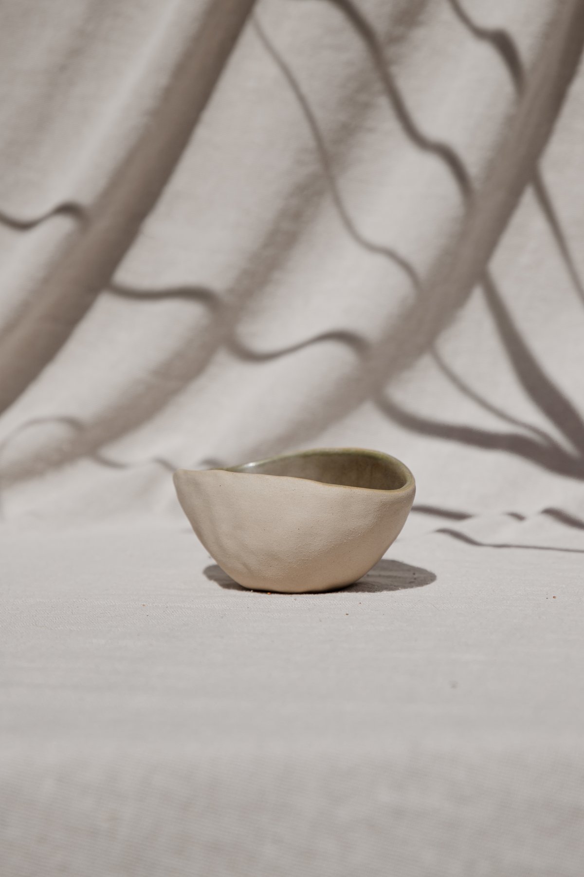 The Nesting Bowls &mdash; a single bowl showing the raw exterior and glazed interior