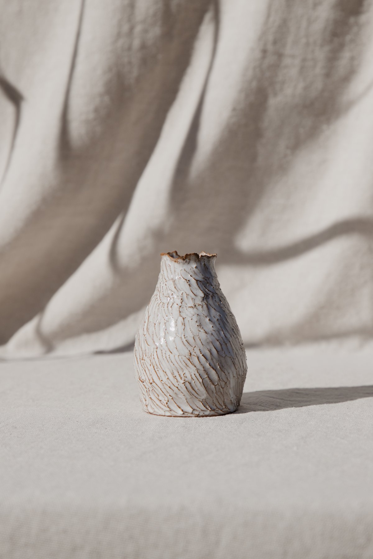 The Lab of Textures &mdash; a smaller carved piece showing the exposed clay edges