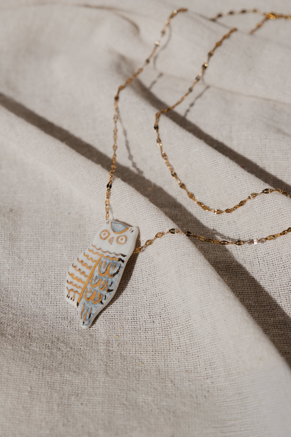 The Owl Pendant &mdash; a hand-painted owl pendant on a fine double chain