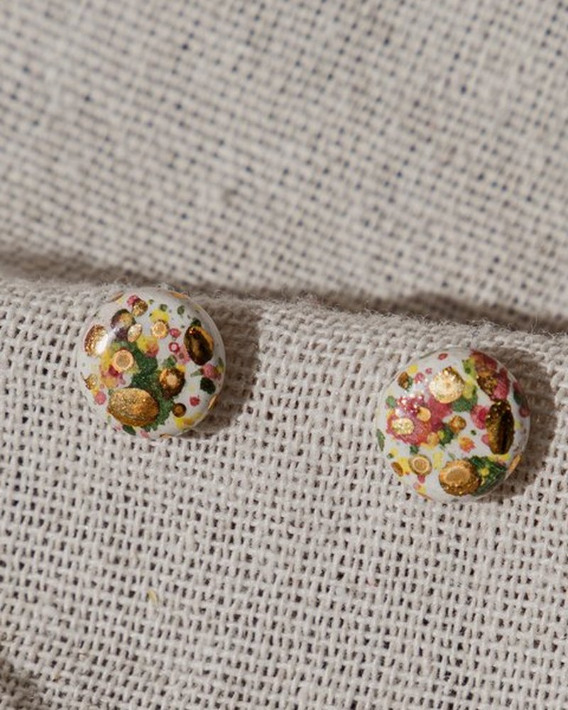 The Fragment Studs &mdash; close-up of the earthy patterning and gold accents